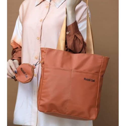 Practical tote bag made of synthetic leather with a small pocket-1