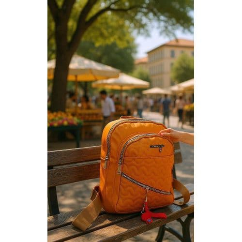 Stylish faux leather backpack with multiple pockets.