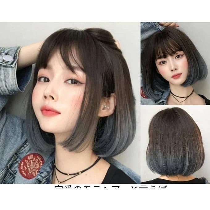 Brown thermal fiber wig with gray ends and bangs on the forehead
