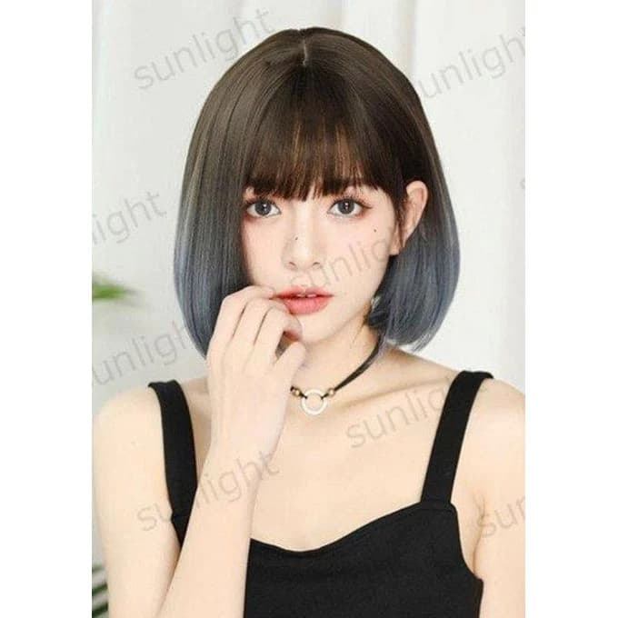 Brown thermal fiber wig with gray ends and bangs on the forehead