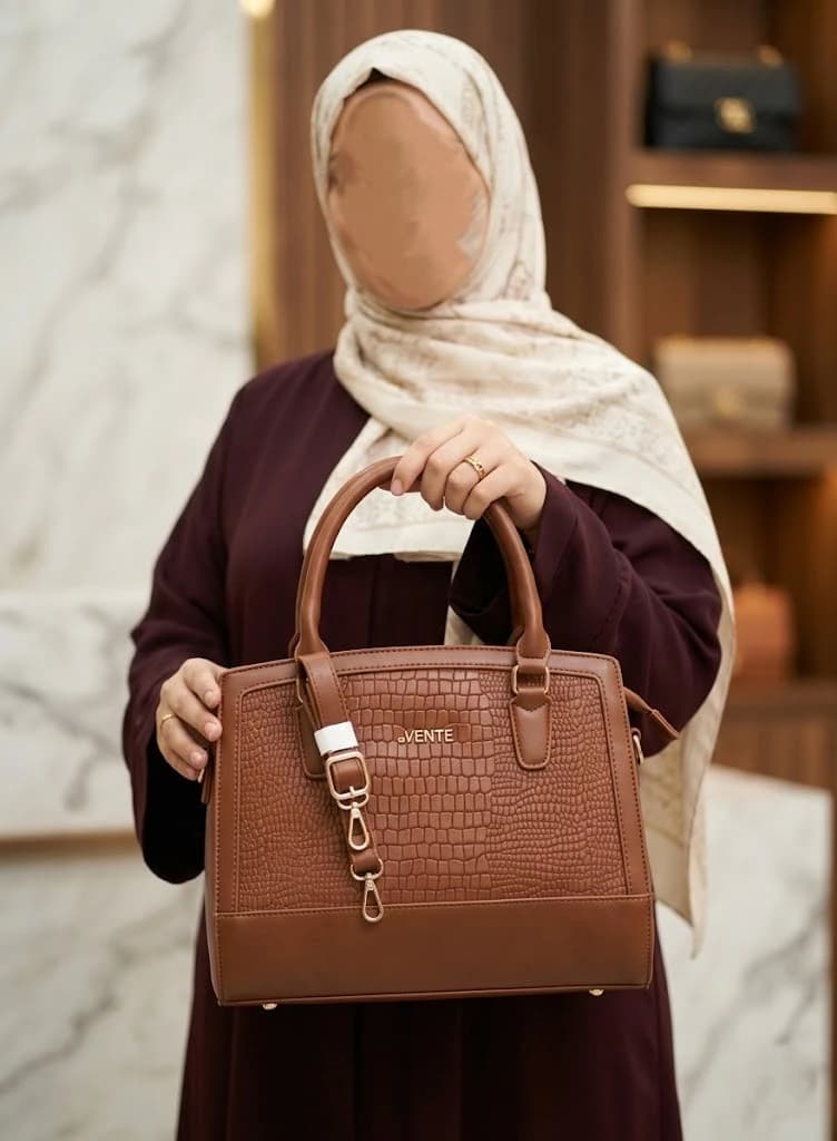 Women's handbag with crocodile print design