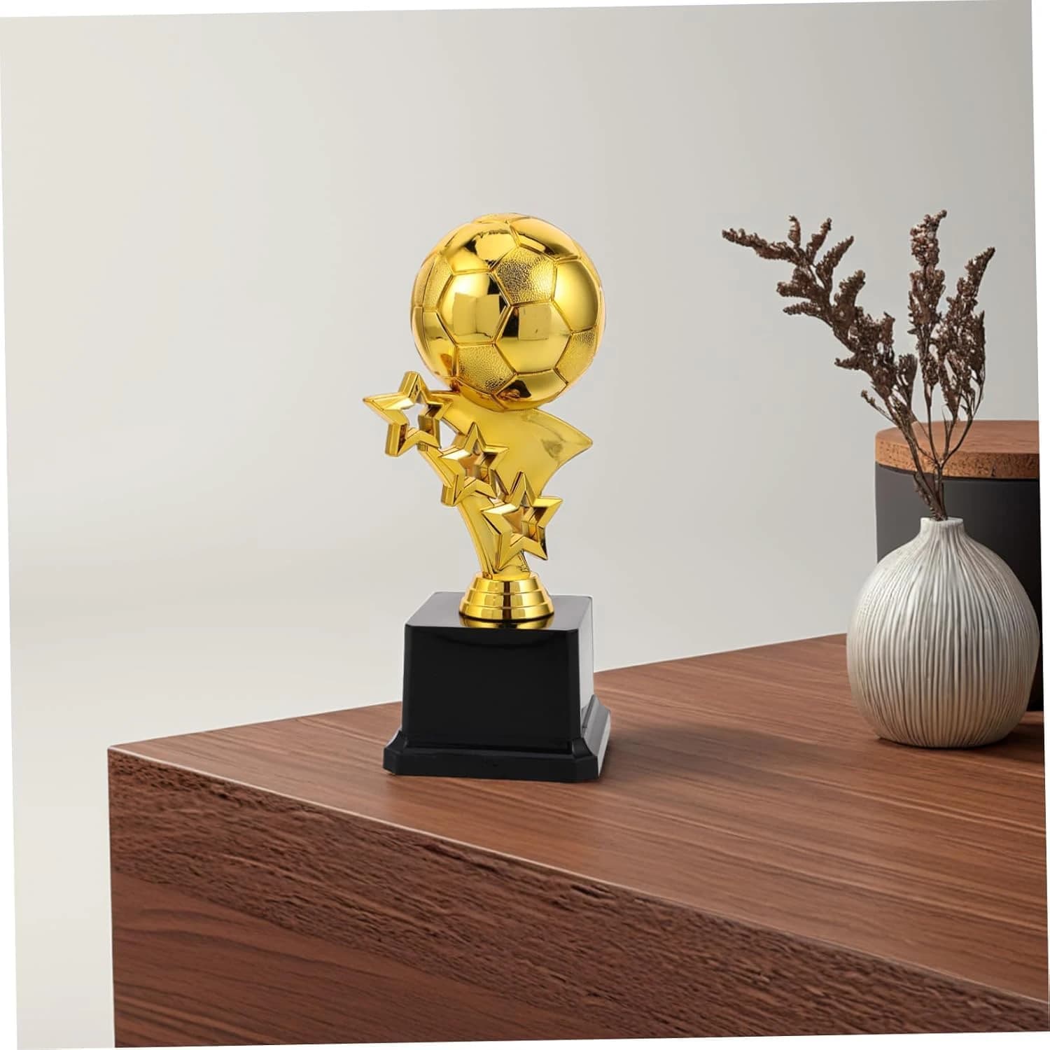Gold football trophy with star design and base - commemorative statue 