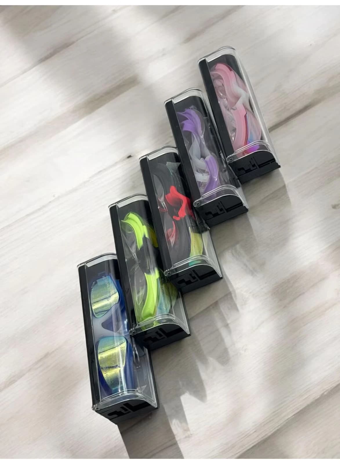 Swimming goggles with clear vision lenses and a back lock for a comfortable fit 
