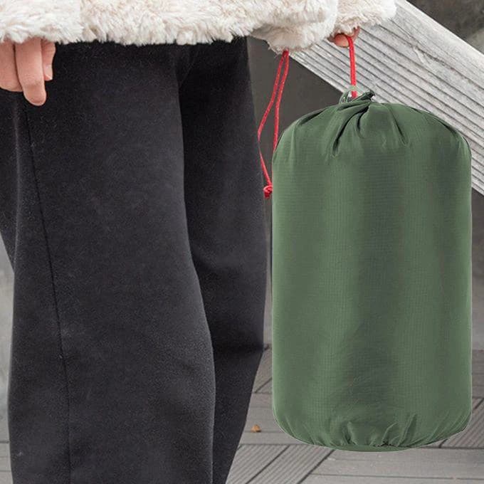 The sleeping bag's outer material is waterproof and the inner material is cotton