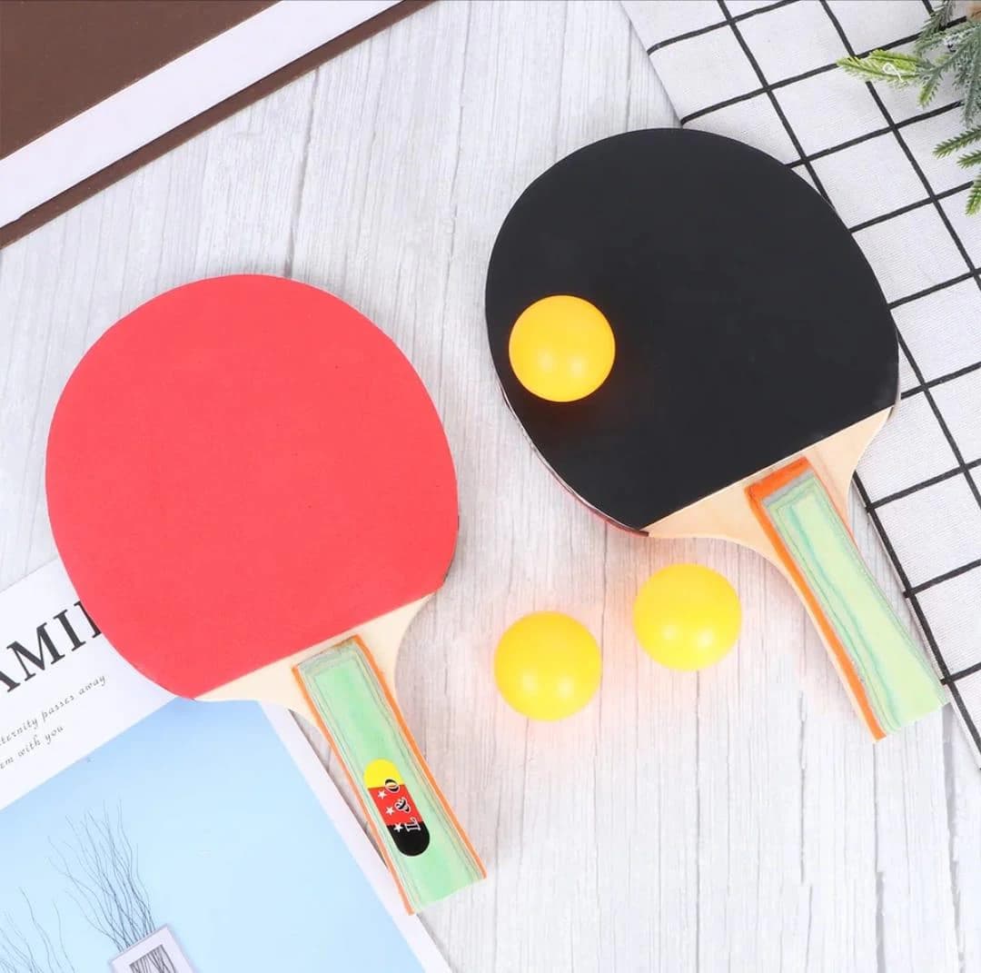Two ping pong rackets + three table tennis balls ( Color may vary )