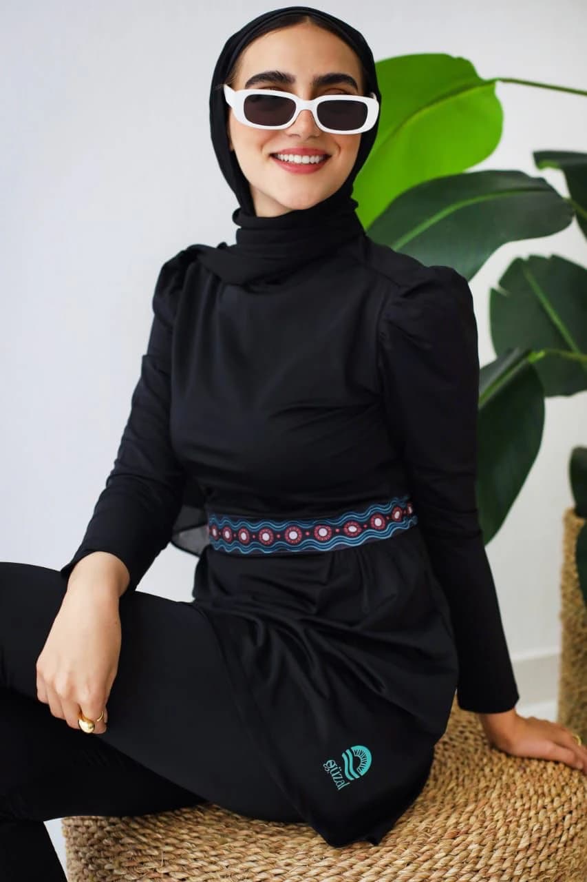 Kemer Elegant Black Dress with Black Leggings